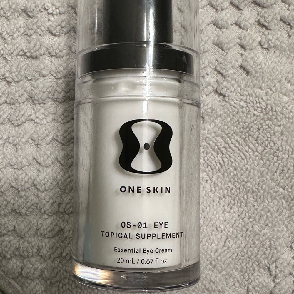 One Skin White and Black Skincare Bottle